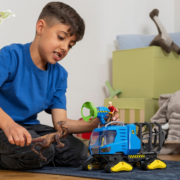 DINOSAURS vangvoertuig met Dakotaraptor en Ranger Flynn